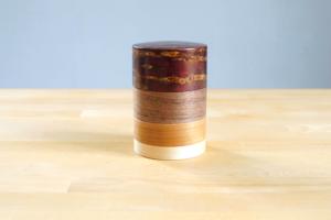 Tea canister in four types of wood (cherry bark)   